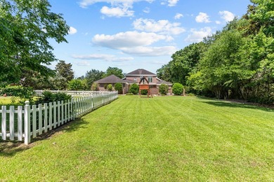 NEW ROOF for this Truly Iconic Offering. This distinguished on Highland Oaks Golf Course in Alabama - for sale on GolfHomes.com, golf home, golf lot