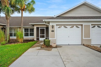 Discover the charm and elegance of this beautifully updated home on Arlington Ridge Golf Club in Florida - for sale on GolfHomes.com, golf home, golf lot