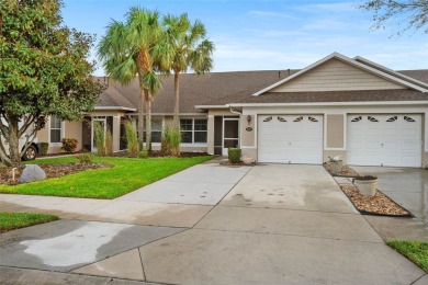 Discover the charm and elegance of this beautifully updated home on Arlington Ridge Golf Club in Florida - for sale on GolfHomes.com, golf home, golf lot