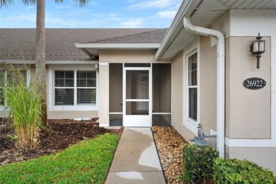 Discover the charm and elegance of this beautifully updated home on Arlington Ridge Golf Club in Florida - for sale on GolfHomes.com, golf home, golf lot