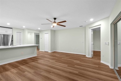 Discover the charm and elegance of this beautifully updated home on Arlington Ridge Golf Club in Florida - for sale on GolfHomes.com, golf home, golf lot