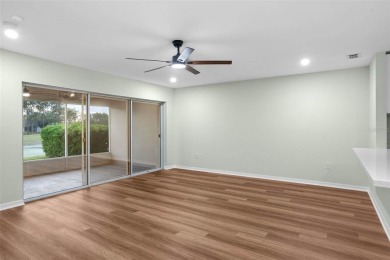 Discover the charm and elegance of this beautifully updated home on Arlington Ridge Golf Club in Florida - for sale on GolfHomes.com, golf home, golf lot