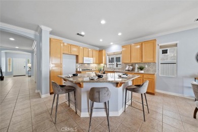 This beautifully maintained Trento model is located in The Oasis on Menifee Lakes Country Club - Lakes in California - for sale on GolfHomes.com, golf home, golf lot