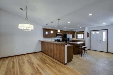 Welcome home to this stunning private-entry condo featuring open on Foxboro Golf Club in Wisconsin - for sale on GolfHomes.com, golf home, golf lot