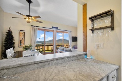 Incredible lake views from this Top of the World townhome. This on Top Of The World Golf Resort in New York - for sale on GolfHomes.com, golf home, golf lot