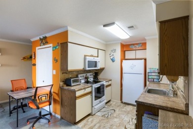 Your perfect lake escape awaits! This beautifully updated on Tan-Tar-A Golf Club in Missouri - for sale on GolfHomes.com, golf home, golf lot