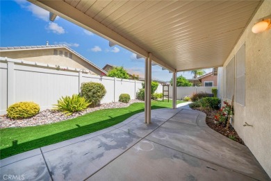 This beautifully maintained Trento model is located in The Oasis on Menifee Lakes Country Club - Lakes in California - for sale on GolfHomes.com, golf home, golf lot