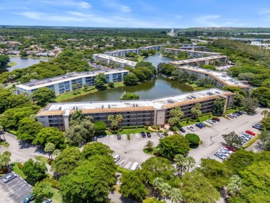 This beautifully updated,  2-bedroom, 2-bathroom condo is on Wynmoor Golf Course in Florida - for sale on GolfHomes.com, golf home, golf lot