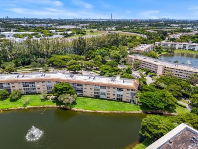 This beautifully updated,  2-bedroom, 2-bathroom condo is on Wynmoor Golf Course in Florida - for sale on GolfHomes.com, golf home, golf lot