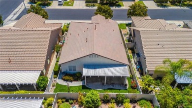 This beautifully maintained Trento model is located in The Oasis on Menifee Lakes Country Club - Lakes in California - for sale on GolfHomes.com, golf home, golf lot