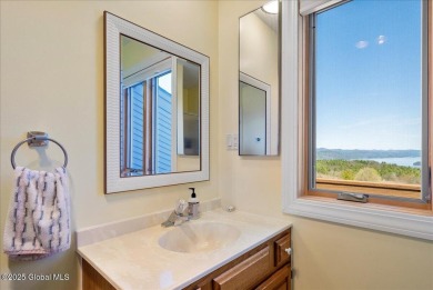 Incredible lake views from this Top of the World townhome. This on Top Of The World Golf Resort in New York - for sale on GolfHomes.com, golf home, golf lot
