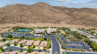 This beautifully maintained Trento model is located in The Oasis on Menifee Lakes Country Club - Lakes in California - for sale on GolfHomes.com, golf home, golf lot