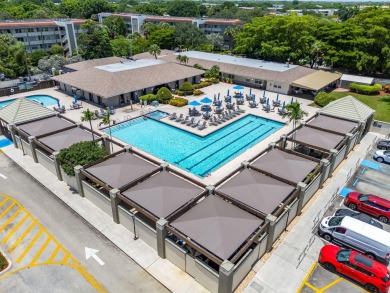 This beautifully updated,  2-bedroom, 2-bathroom condo is on Wynmoor Golf Course in Florida - for sale on GolfHomes.com, golf home, golf lot