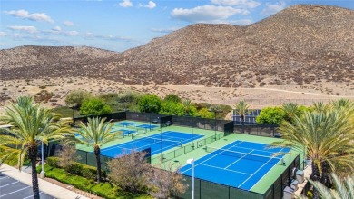 This beautifully maintained Trento model is located in The Oasis on Menifee Lakes Country Club - Lakes in California - for sale on GolfHomes.com, golf home, golf lot