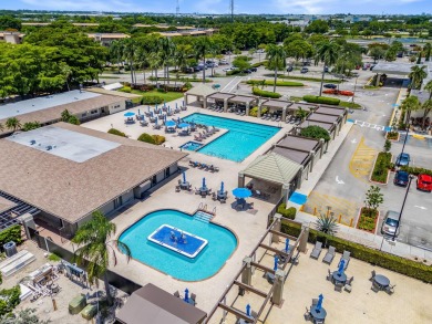 This beautifully updated,  2-bedroom, 2-bathroom condo is on Wynmoor Golf Course in Florida - for sale on GolfHomes.com, golf home, golf lot