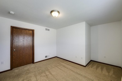 Welcome home to this stunning private-entry condo featuring open on Foxboro Golf Club in Wisconsin - for sale on GolfHomes.com, golf home, golf lot