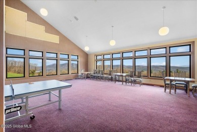 Incredible lake views from this Top of the World townhome. This on Top Of The World Golf Resort in New York - for sale on GolfHomes.com, golf home, golf lot