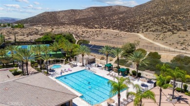 This beautifully maintained Trento model is located in The Oasis on Menifee Lakes Country Club - Lakes in California - for sale on GolfHomes.com, golf home, golf lot