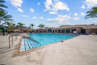 This beautifully maintained Trento model is located in The Oasis on Menifee Lakes Country Club - Lakes in California - for sale on GolfHomes.com, golf home, golf lot