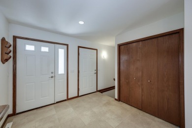 Welcome home to this stunning private-entry condo featuring open on Foxboro Golf Club in Wisconsin - for sale on GolfHomes.com, golf home, golf lot