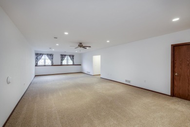 Welcome home to this stunning private-entry condo featuring open on Foxboro Golf Club in Wisconsin - for sale on GolfHomes.com, golf home, golf lot