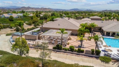 This beautifully maintained Trento model is located in The Oasis on Menifee Lakes Country Club - Lakes in California - for sale on GolfHomes.com, golf home, golf lot