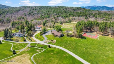 Incredible lake views from this Top of the World townhome. This on Top Of The World Golf Resort in New York - for sale on GolfHomes.com, golf home, golf lot