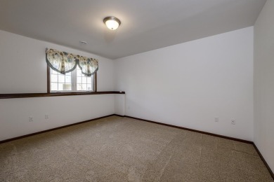 Welcome home to this stunning private-entry condo featuring open on Foxboro Golf Club in Wisconsin - for sale on GolfHomes.com, golf home, golf lot
