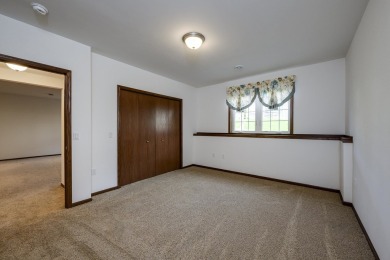 Welcome home to this stunning private-entry condo featuring open on Foxboro Golf Club in Wisconsin - for sale on GolfHomes.com, golf home, golf lot