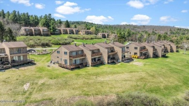 Incredible lake views from this Top of the World townhome. This on Top Of The World Golf Resort in New York - for sale on GolfHomes.com, golf home, golf lot