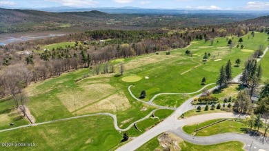 Incredible lake views from this Top of the World townhome. This on Top Of The World Golf Resort in New York - for sale on GolfHomes.com, golf home, golf lot