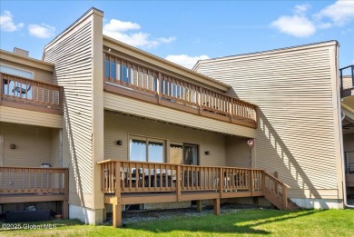 Incredible lake views from this Top of the World townhome. This on Top Of The World Golf Resort in New York - for sale on GolfHomes.com, golf home, golf lot