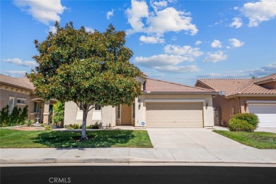 This beautifully maintained Trento model is located in The Oasis on Menifee Lakes Country Club - Lakes in California - for sale on GolfHomes.com, golf home, golf lot