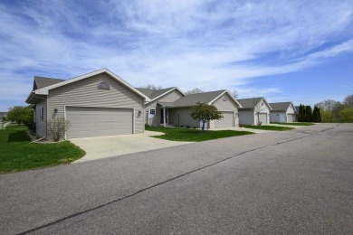 Welcome home to this stunning private-entry condo featuring open on Foxboro Golf Club in Wisconsin - for sale on GolfHomes.com, golf home, golf lot
