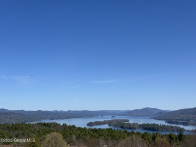 Incredible lake views from this Top of the World townhome. This on Top Of The World Golf Resort in New York - for sale on GolfHomes.com, golf home, golf lot