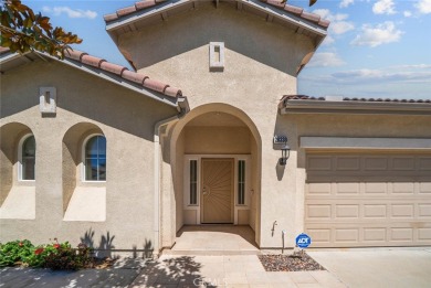 This beautifully maintained Trento model is located in The Oasis on Menifee Lakes Country Club - Lakes in California - for sale on GolfHomes.com, golf home, golf lot