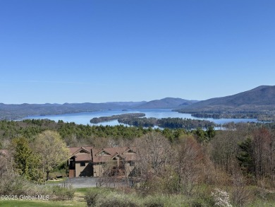 Incredible lake views from this Top of the World townhome. This on Top Of The World Golf Resort in New York - for sale on GolfHomes.com, golf home, golf lot