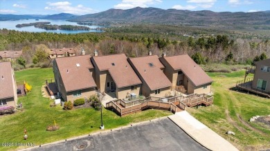Incredible lake views from this Top of the World townhome. This on Top Of The World Golf Resort in New York - for sale on GolfHomes.com, golf home, golf lot