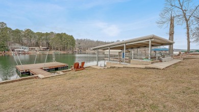 Wake up to stunning lake views and enjoy the best of waterfront on Cherokee Village North Course in Arkansas - for sale on GolfHomes.com, golf home, golf lot