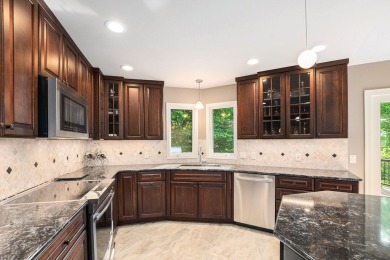 Experience the best of both worlds in this beautifully appointed on HawksHead Links in Michigan - for sale on GolfHomes.com, golf home, golf lot