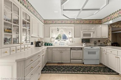 Welcome to this gorgeous 4-bedroom colonial in the heart of on Riverview Highlands Golf Club  in Michigan - for sale on GolfHomes.com, golf home, golf lot