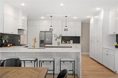 Discover refined elegance in this fully remodeled 5-bedroom,4.5 on Ironhorse Golf Club in Kansas - for sale on GolfHomes.com, golf home, golf lot