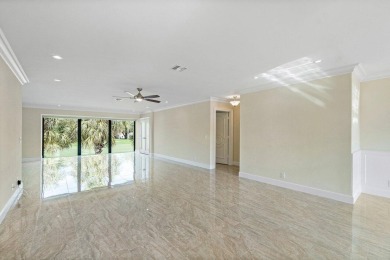 Exceptional residence with sweeping golf course views. Step into on Quail Ridge Golf Course and Country Club in Florida - for sale on GolfHomes.com, golf home, golf lot