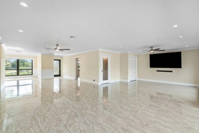 Exceptional residence with sweeping golf course views. Step into on Quail Ridge Golf Course and Country Club in Florida - for sale on GolfHomes.com, golf home, golf lot