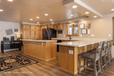 Spacious residence bordering the #7 hole at Cedar Creek Golf on  in Wyoming - for sale on GolfHomes.com, golf home, golf lot