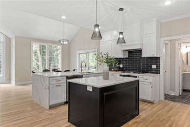 Discover refined elegance in this fully remodeled 5-bedroom,4.5 on Ironhorse Golf Club in Kansas - for sale on GolfHomes.com, golf home, golf lot