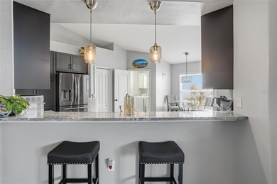 Imagine a place where every day feels like a pause button on on Heritage Isles Golf and Country Club in Florida - for sale on GolfHomes.com, golf home, golf lot