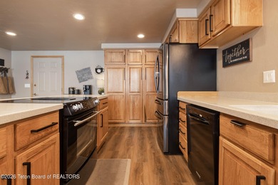 Spacious residence bordering the #7 hole at Cedar Creek Golf on  in Wyoming - for sale on GolfHomes.com, golf home, golf lot