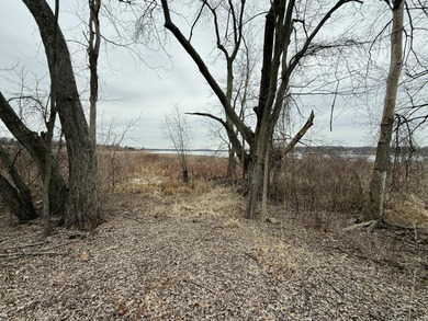 Discover Your Perfect Retreat on Duck Lake! Unlock the potential on Duck Lake Country Club in Michigan - for sale on GolfHomes.com, golf home, golf lot