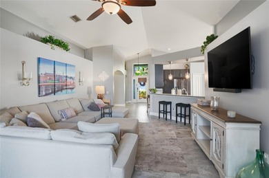 Imagine a place where every day feels like a pause button on on Heritage Isles Golf and Country Club in Florida - for sale on GolfHomes.com, golf home, golf lot